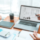 Side view of two people having a finance meeting