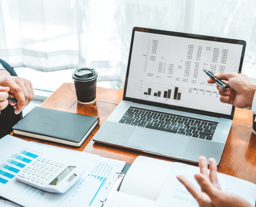 Side view of two people having a finance meeting