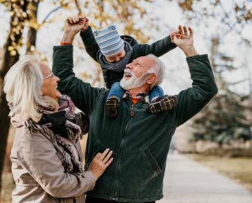 Couple playing with grandchild