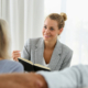 Front view, life insurance rep talking to older couple